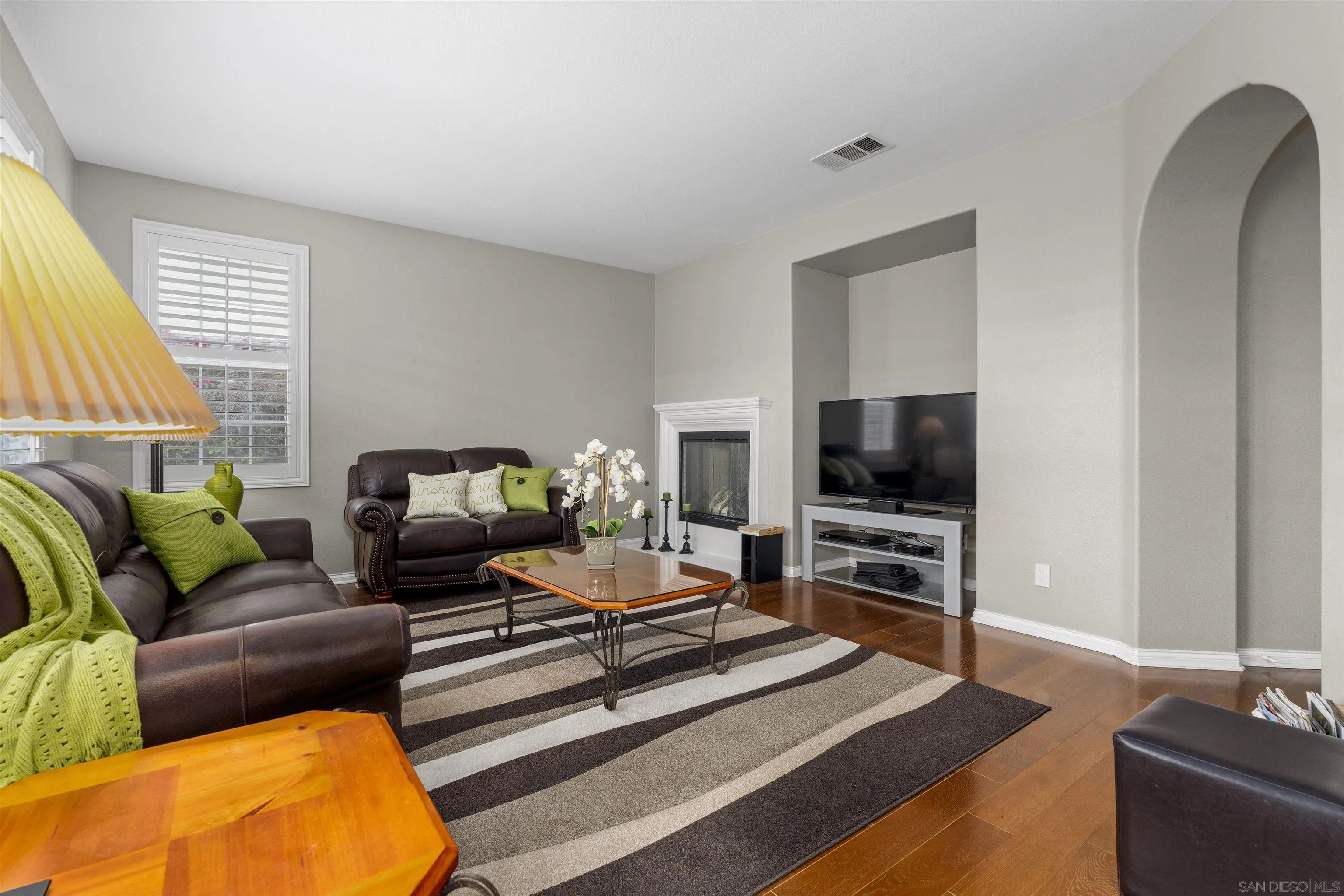 840 Luminara Way San Marcos, CA 92078 - Photo 23 of 57 a living room with furniture and a flat screen tv