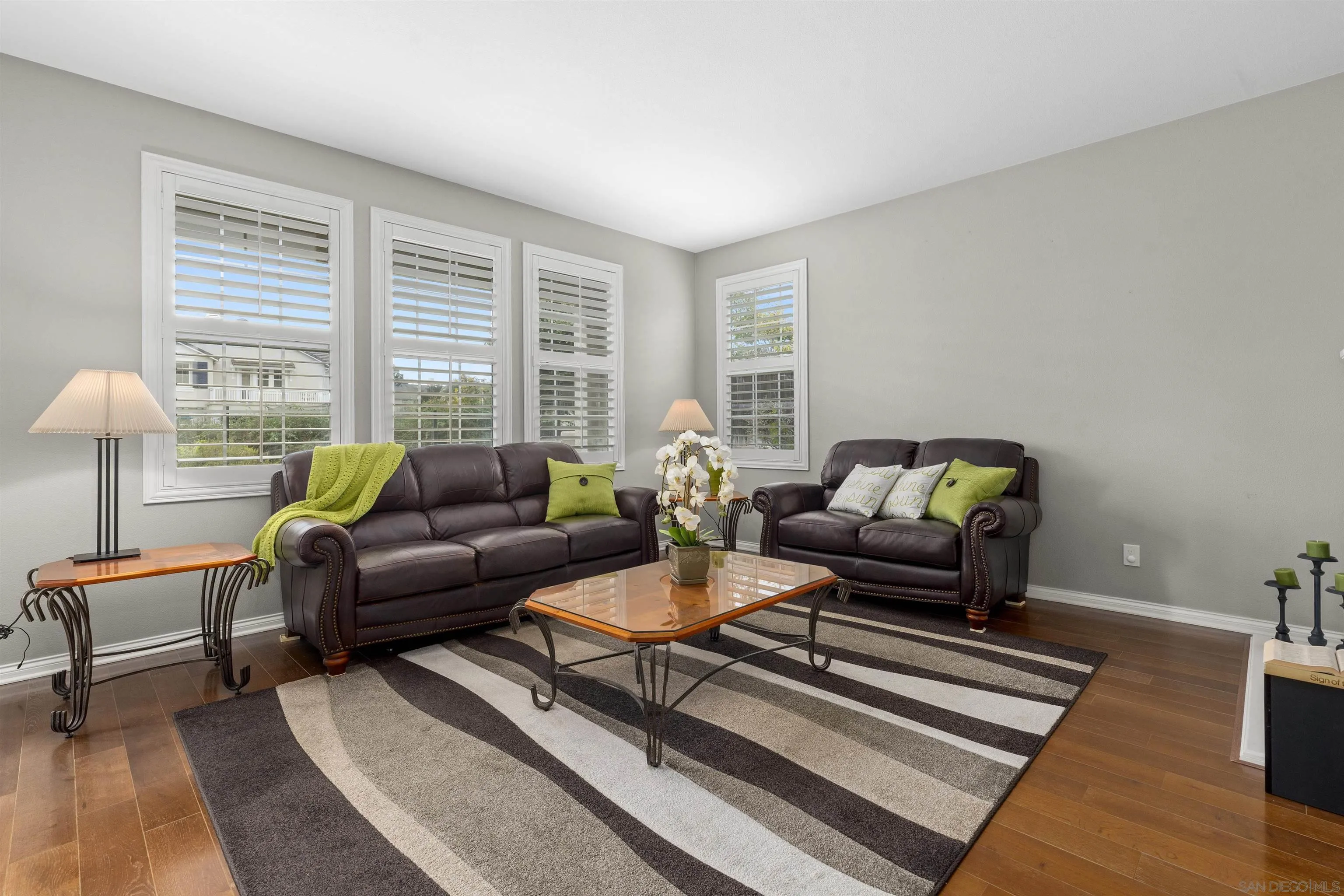 840 Luminara Way San Marcos, CA 92078 - Photo 24 of 57 a living room with furniture and a table