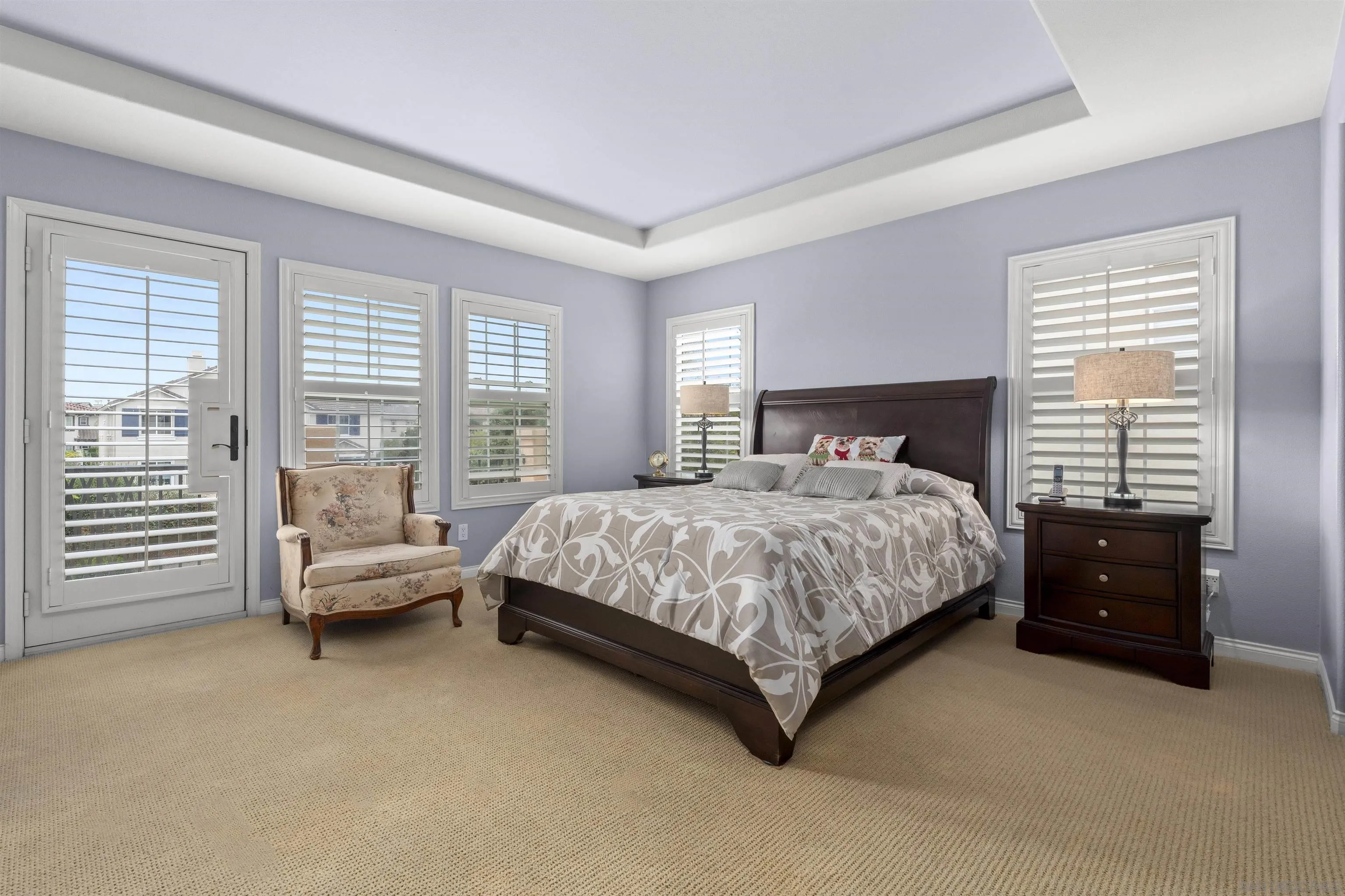 840 Luminara Way San Marcos, CA 92078 - Photo 29 of 57 a bedroom with a bed and a couch