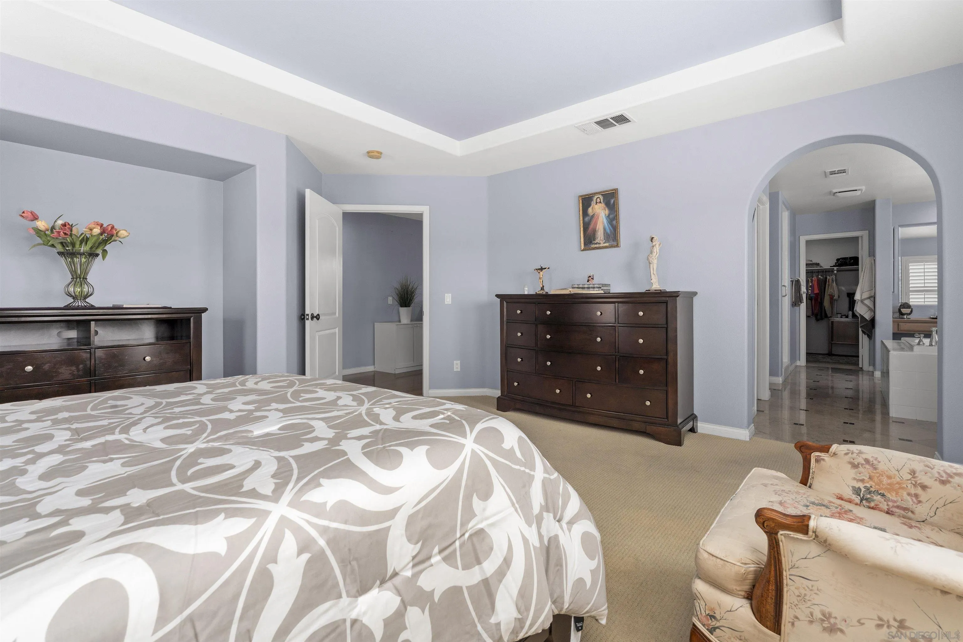 840 Luminara Way San Marcos, CA 92078 - Photo 35 of 57 a bedroom with a bed and a dresser