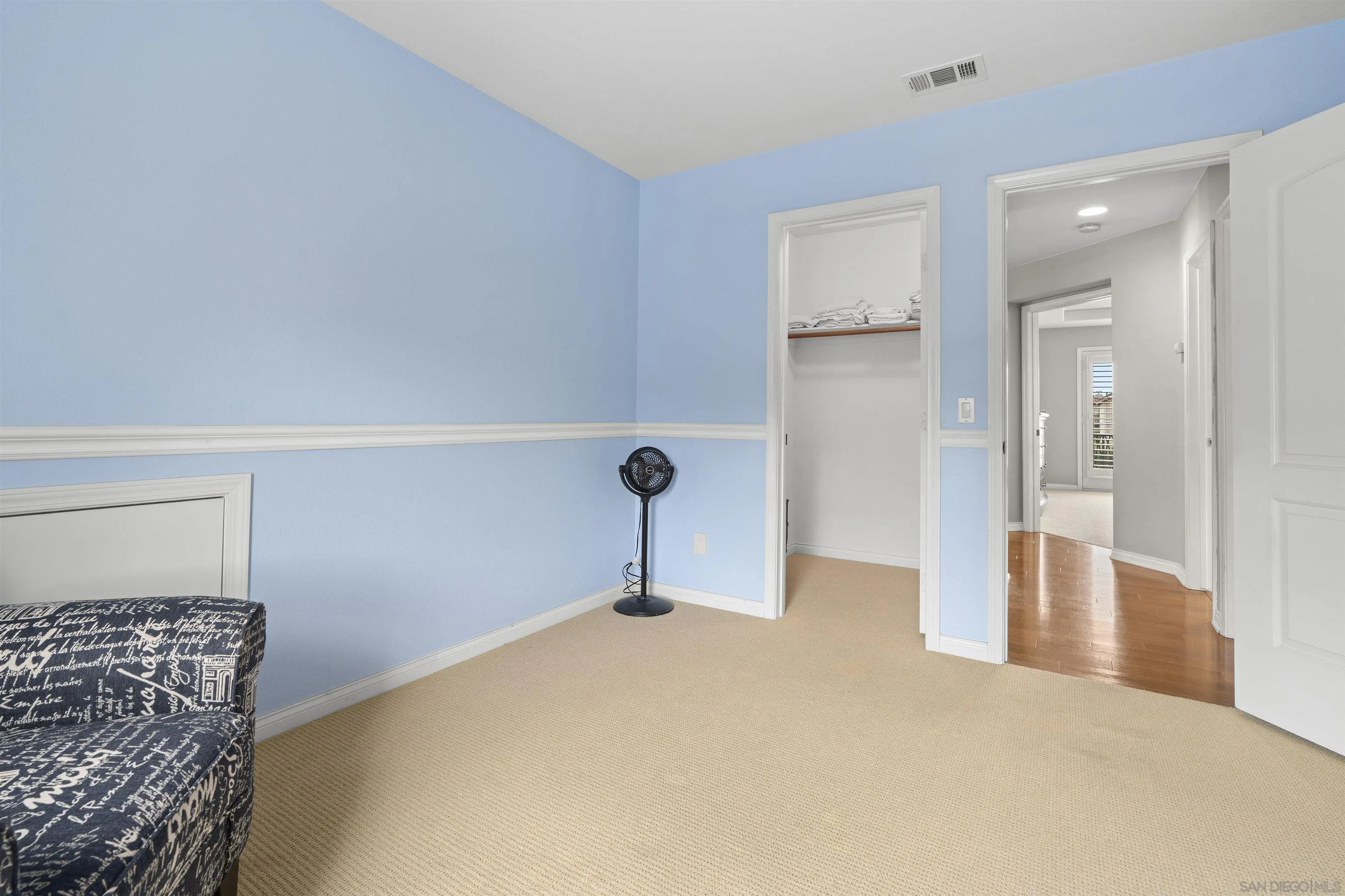 840 Luminara Way San Marcos, CA 92078 - Photo 45 of 57 a view of a livingroom with wooden floor