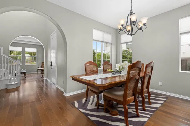a bathroom with a sink a mirror and vanity