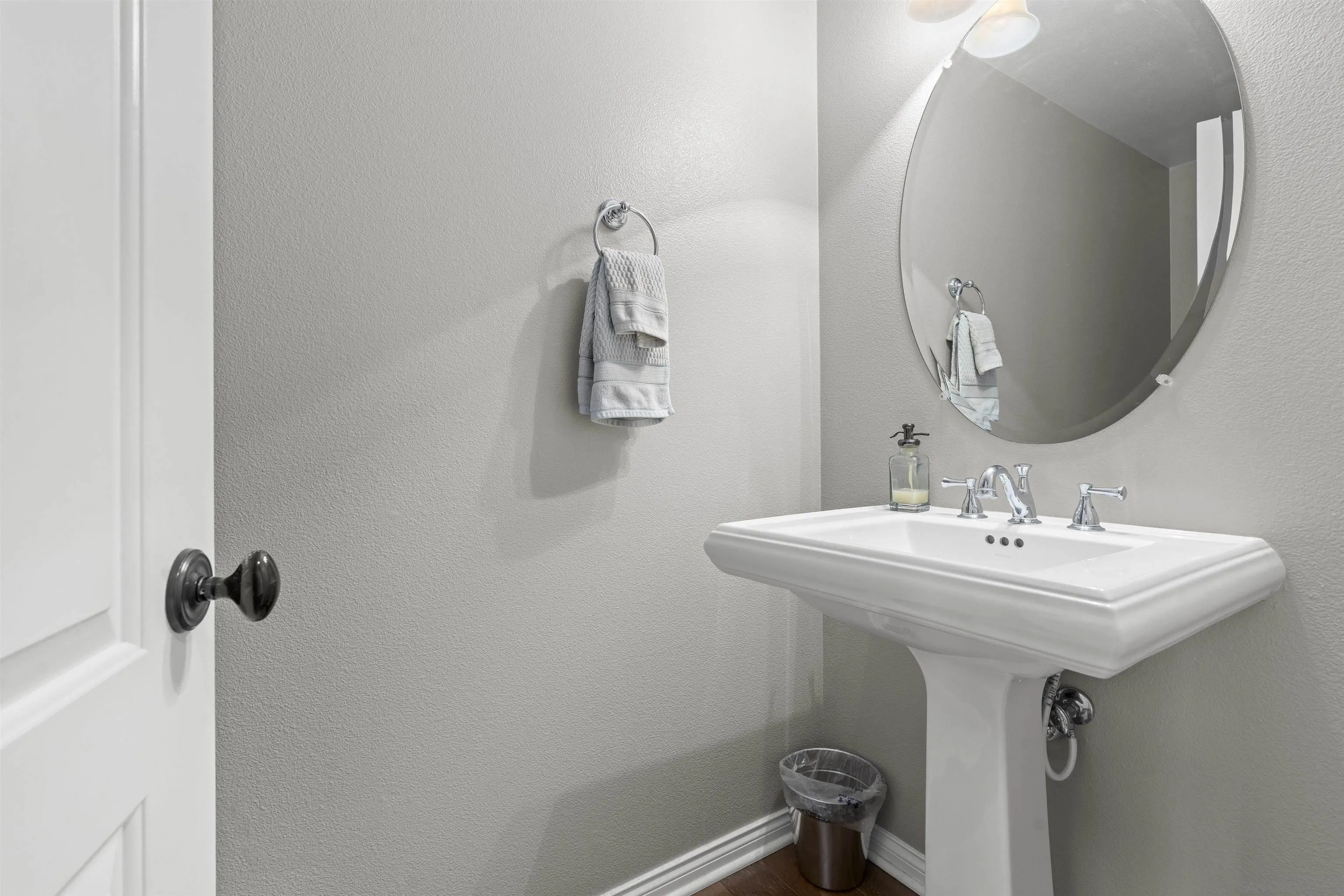 840 Luminara Way San Marcos, CA 92078 - Photo 10 of 57 a bathroom with a sink a mirror and vanity