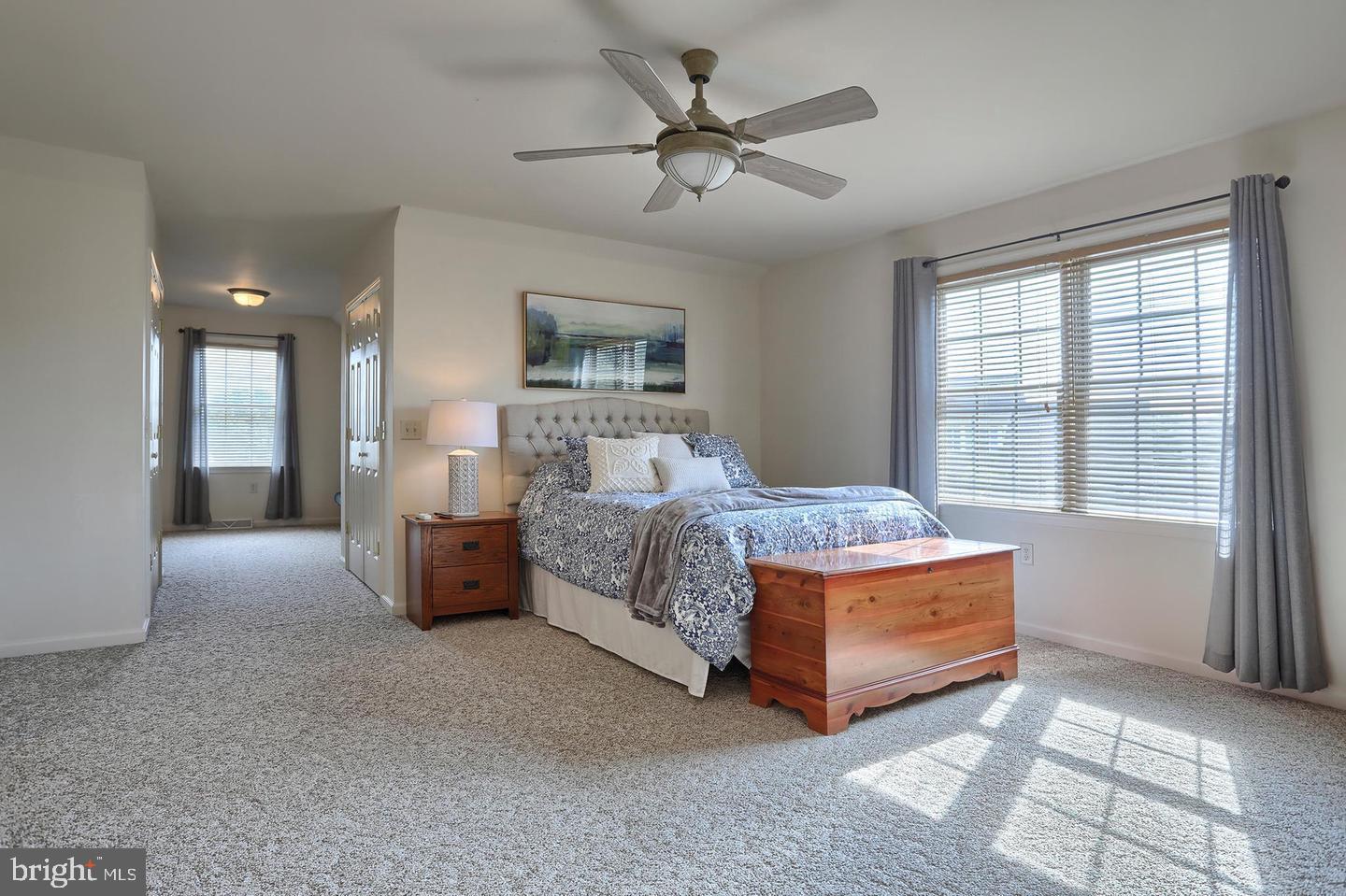 8 Rolling Meadow Road Lebanon, PA 17046 - Photo 14 of 16 a bedroom with a bed and a chandelier