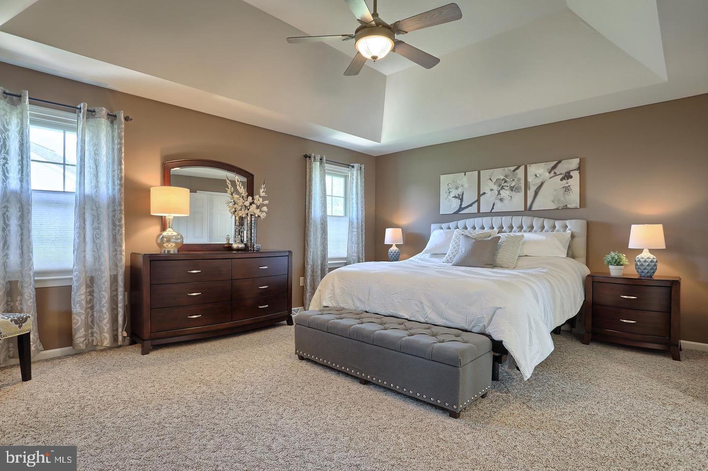 8 Rolling Meadow Road Lebanon, PA 17046 - Photo 16 of 16 a bedroom with a bed and a chandelier