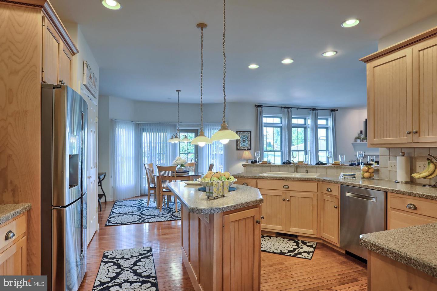 8 Rolling Meadow Road Lebanon, PA 17046 - Photo 6 of 16 a kitchen with a sink stove and wooden cabinets