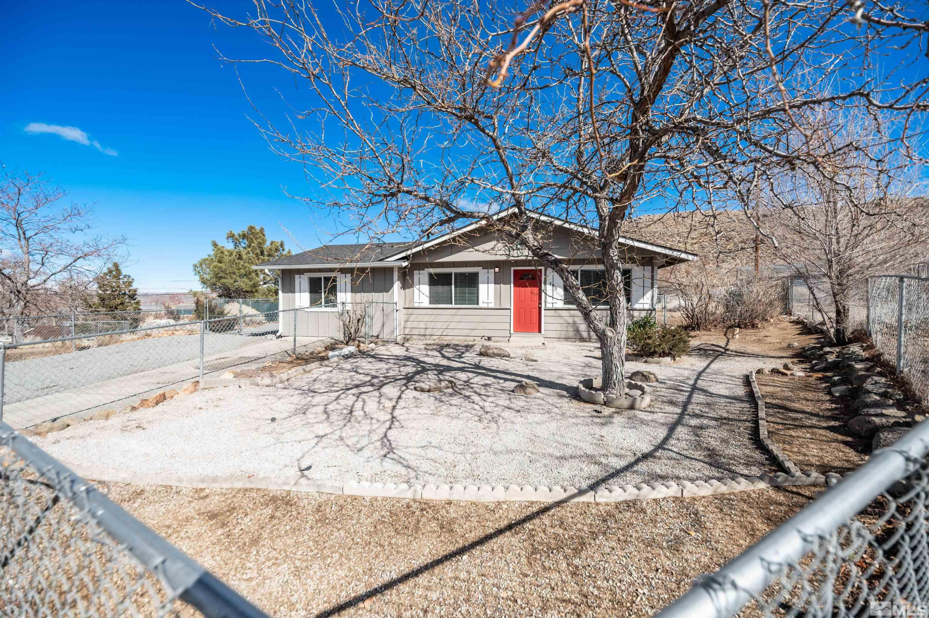 495 Kess Court Reno, NV 89506 - Photo 1 of 18 a view of a house with snow