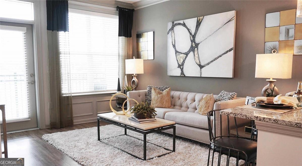 1486 Terrell Mill Road Southeast, Unit 449 Marietta, GA 30067 - Photo 4 of 25 a living room with furniture and a window