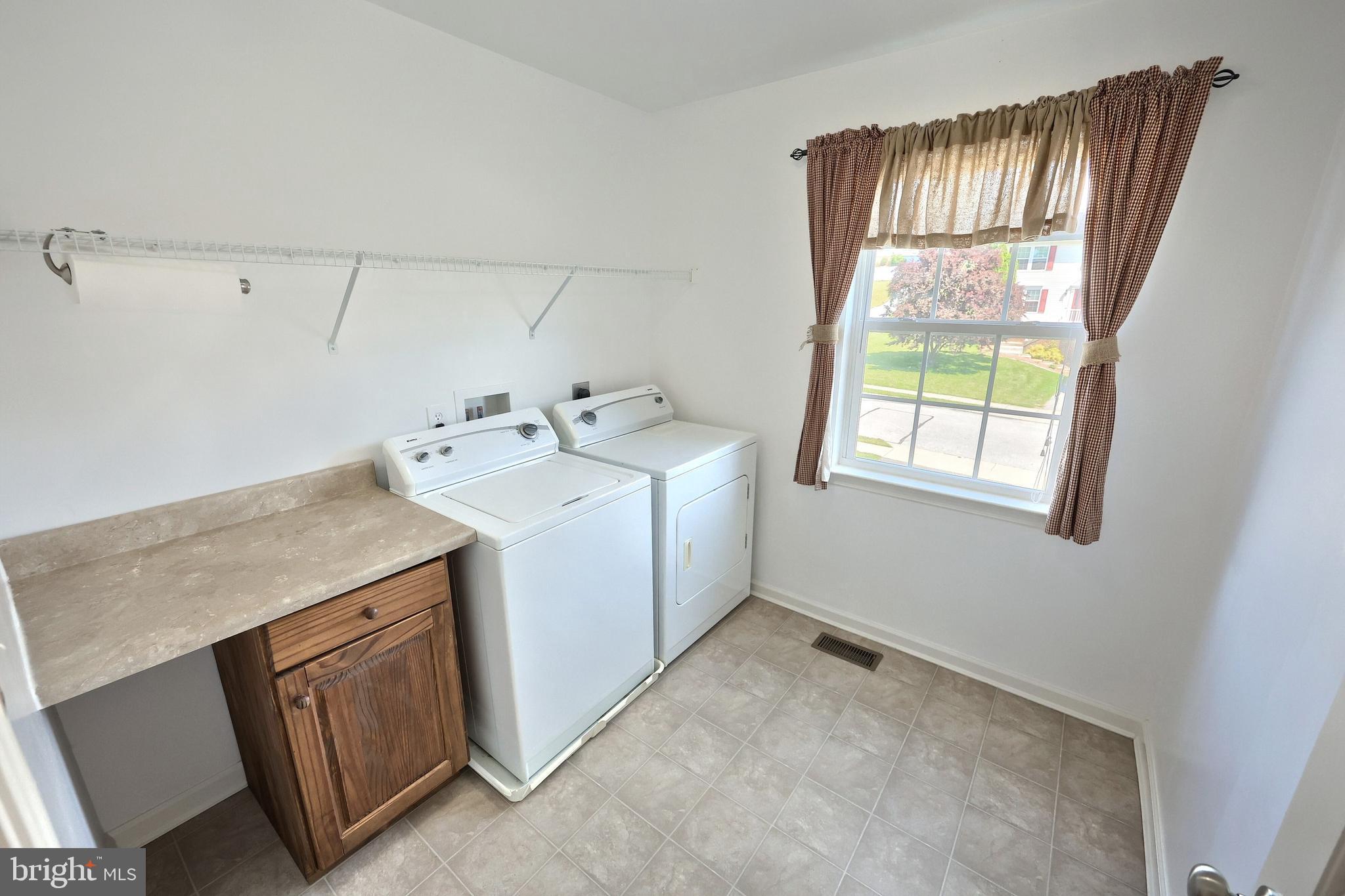 425 Lakeview Drive Spring Grove, PA 17362 - Photo 35 of 51 a utility room with dryer and washer