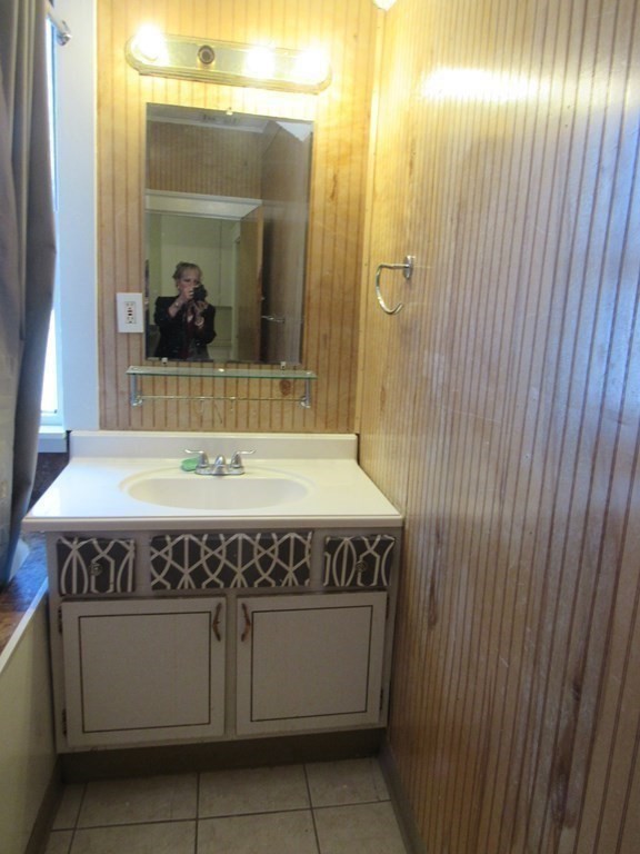 98 Brookline Street, Unit 3 Worcester, MA 01603 - Photo 12 of 33 a view of a bathroom with a sink and mirror