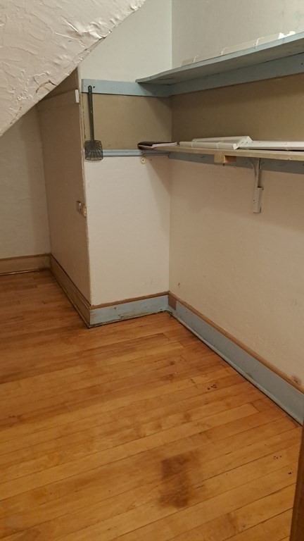 98 Brookline Street, Unit 3 Worcester, MA 01603 - Photo 22 of 33 a view of a room with racks on the wall