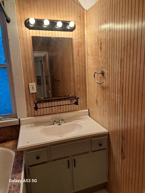 98 Brookline Street, Unit 3 Worcester, MA 01603 - Photo 27 of 33 a bathroom with a sink and a mirror