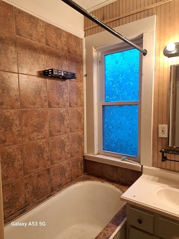 98 Brookline Street, Unit 3 Worcester, MA 01603 - Photo 28 of 33 a bathroom with a sink and a shower
