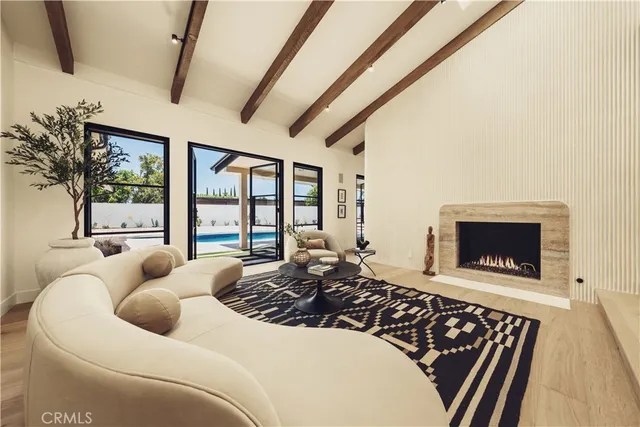 a living room with furniture and window