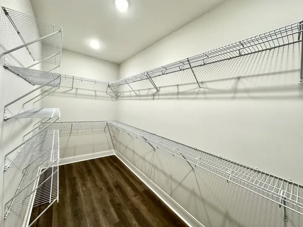a view of a room with racks on the wall