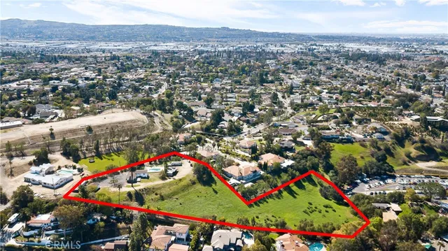 an aerial view of houses and trees