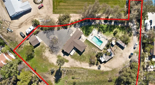 a view of a street with a house