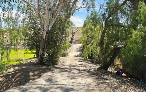 a view of a street with an ocean view