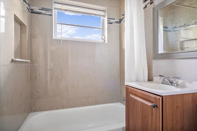 a bathroom with a sink and a bathtub