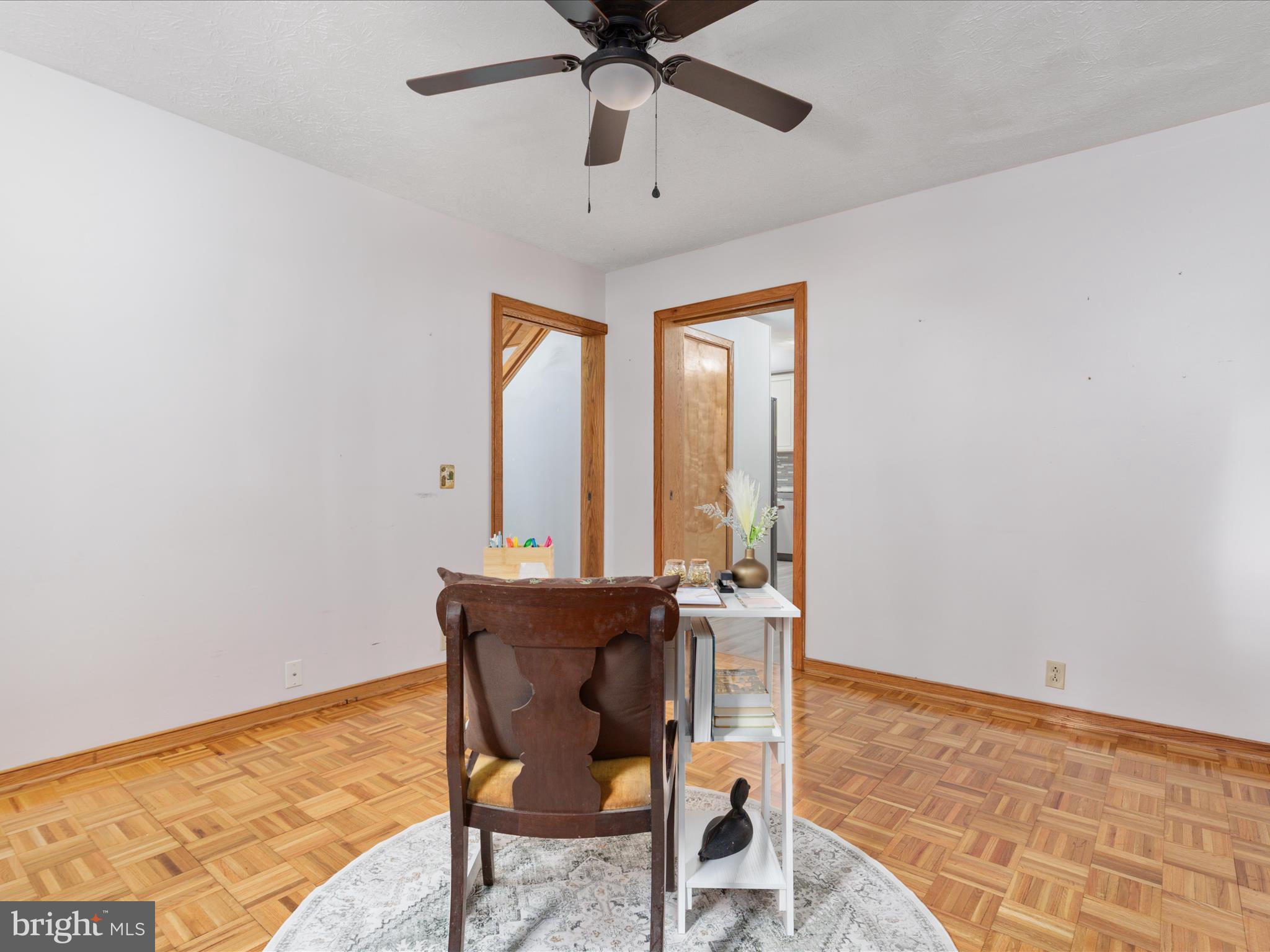 214 Walnut Drive Clear Brook, VA 22624 - Photo 12 of 75 a view of a dining room with furniture and a chandelier fan