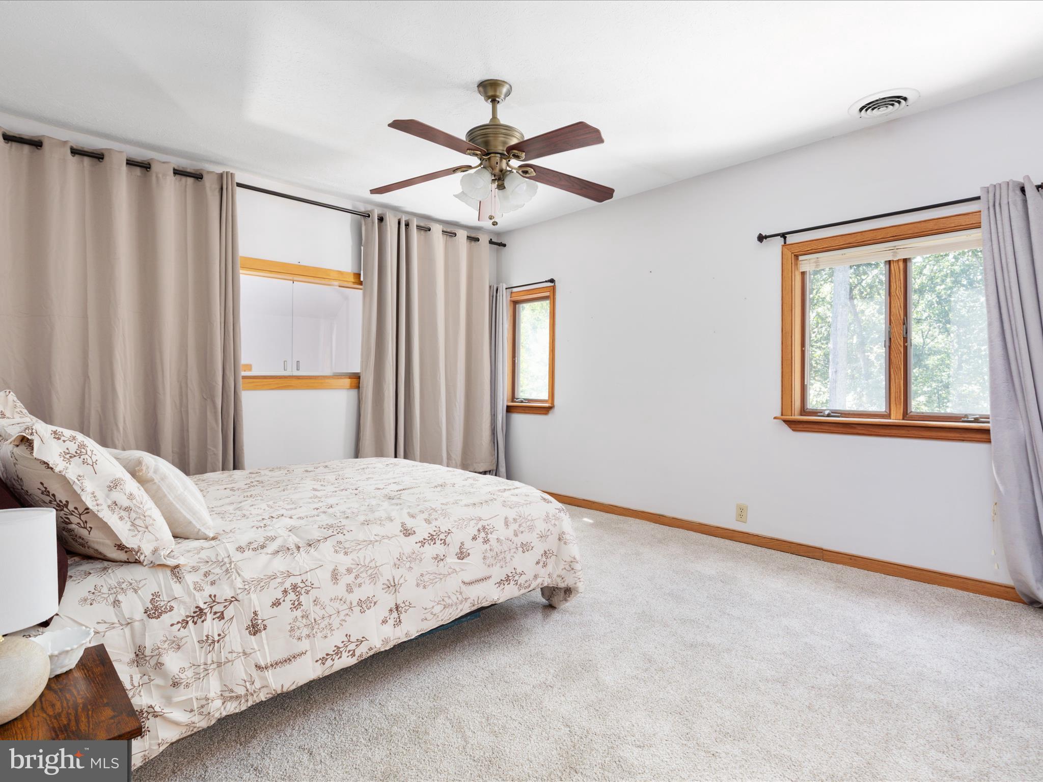 214 Walnut Drive Clear Brook, VA 22624 - Photo 19 of 75 a bedroom with a bed and a window