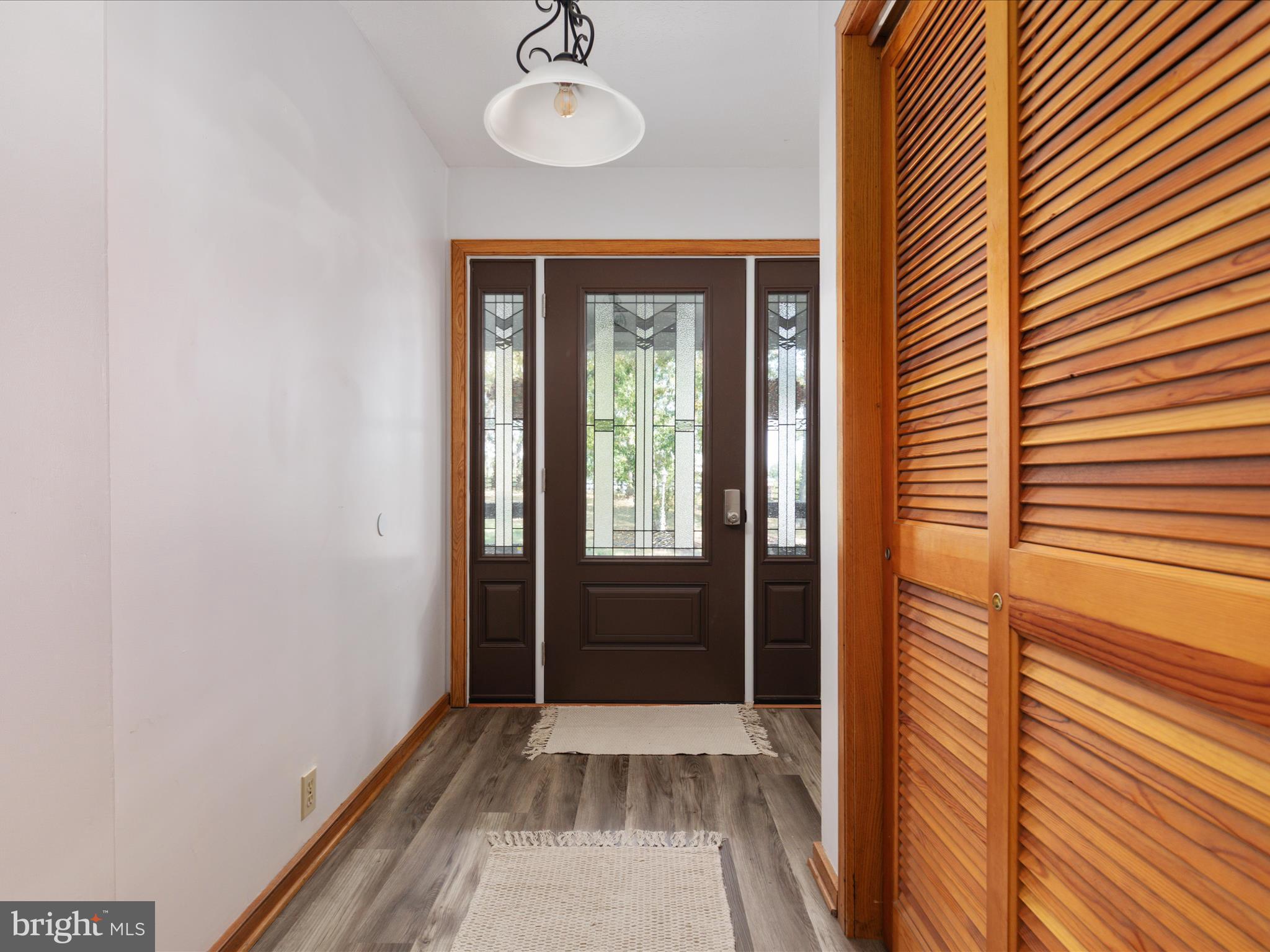 214 Walnut Drive Clear Brook, VA 22624 - Photo 26 of 75 a view of a room with wooden floor and windows
