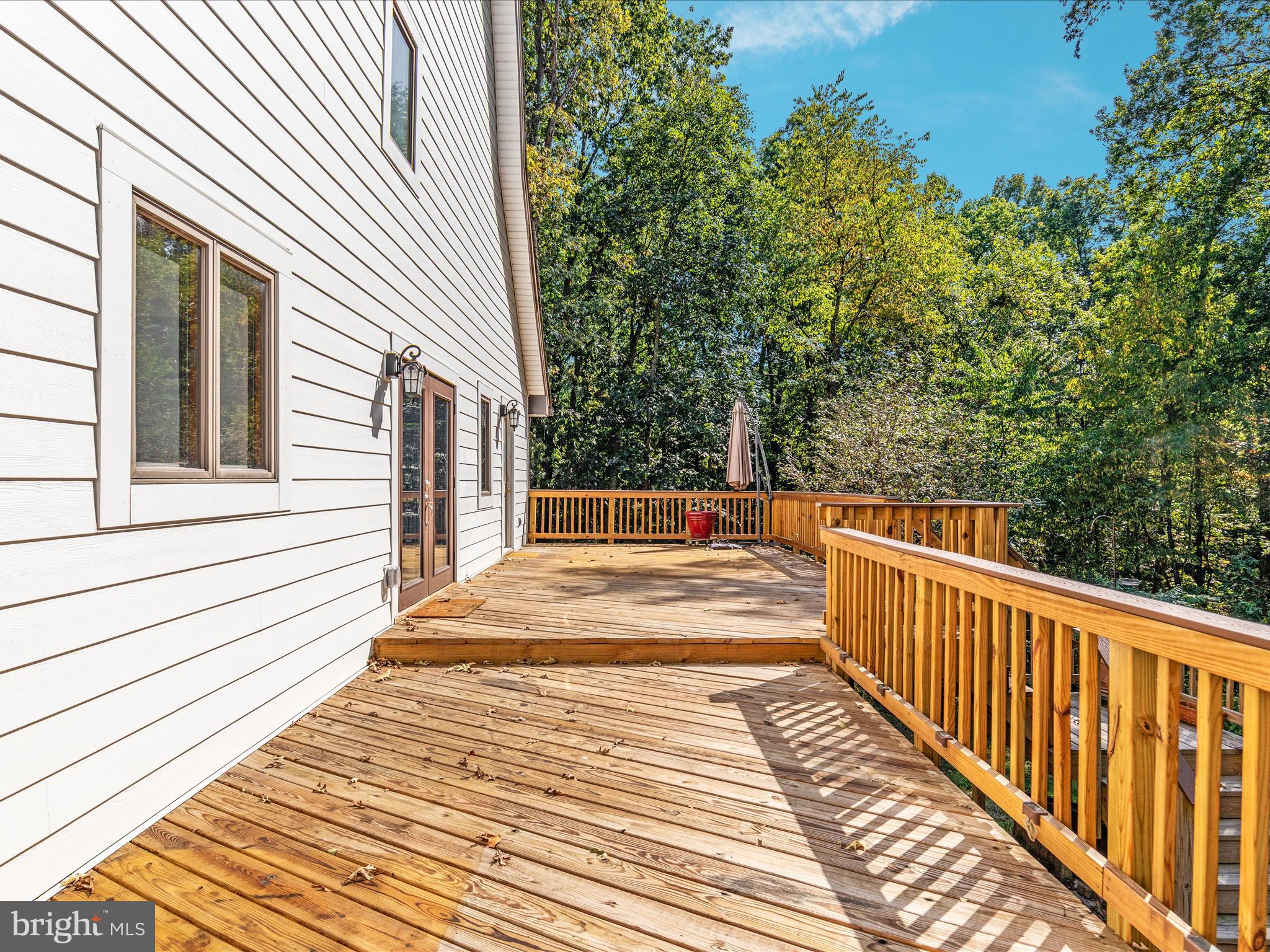 214 Walnut Drive Clear Brook, VA 22624 - Photo 33 of 75 a view of a balcony with wooden floor and fence