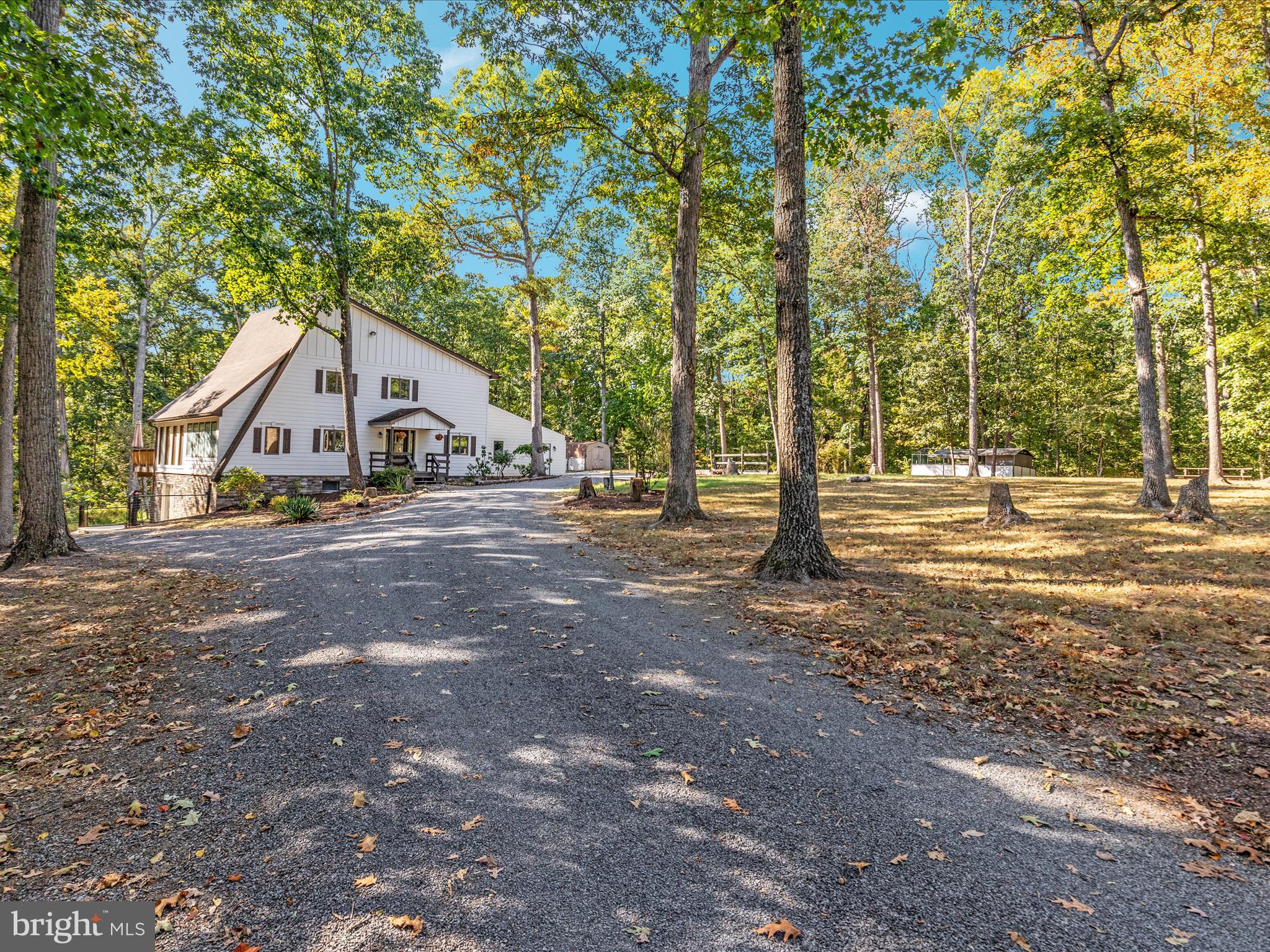 214 Walnut Drive Clear Brook, VA 22624 - Photo 41 of 75 a house with trees in front of it
