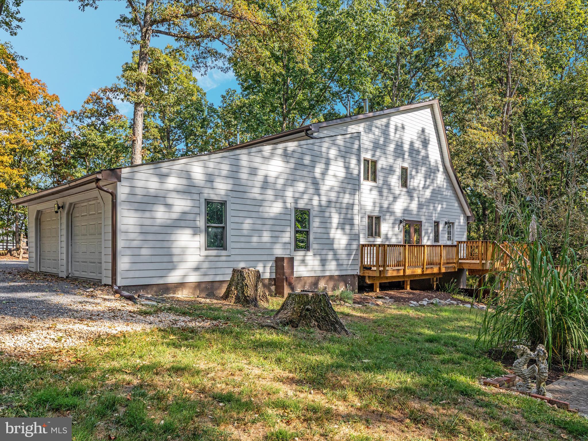 214 Walnut Drive Clear Brook, VA 22624 - Photo 48 of 75 a backyard of a house with outdoor seating