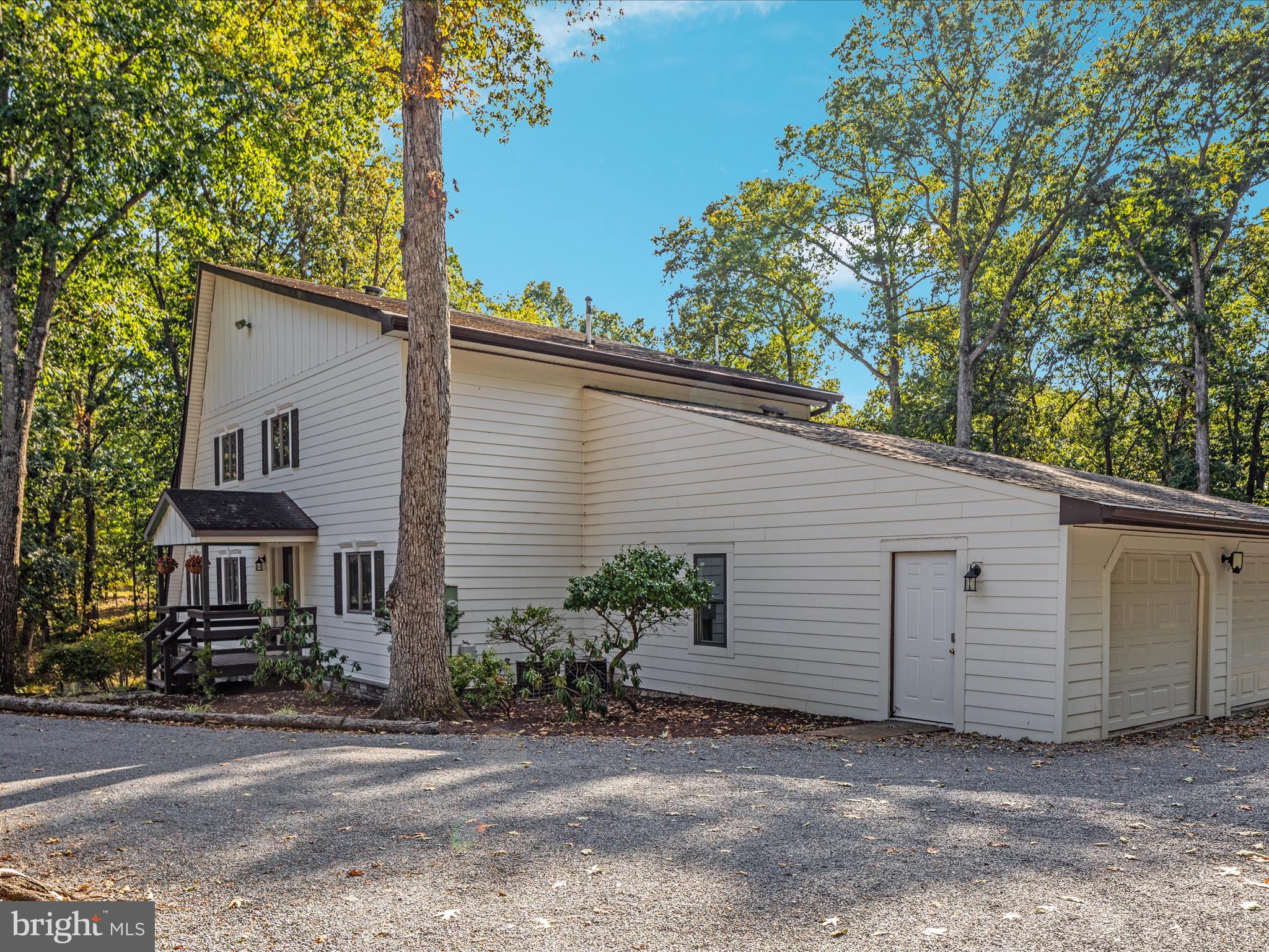 214 Walnut Drive Clear Brook, VA 22624 - Photo 53 of 75 a view of a house with a backyard