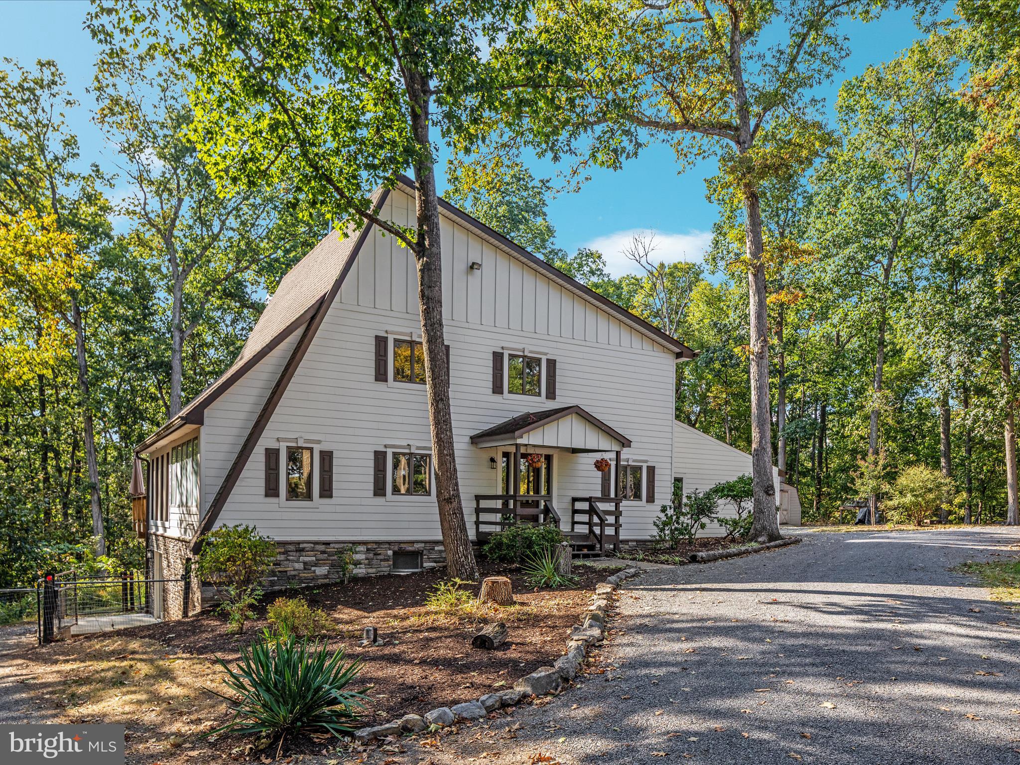 214 Walnut Drive Clear Brook, VA 22624 - Photo 54 of 75 a front view of a house with yard and tree s