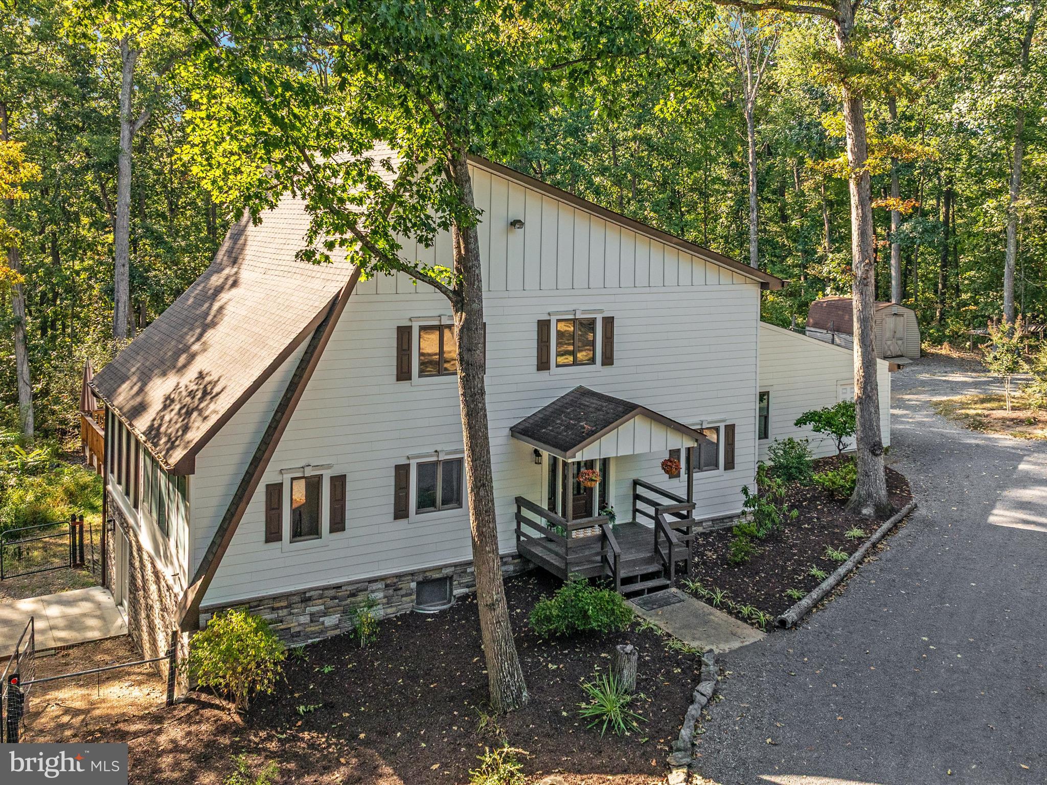 214 Walnut Drive Clear Brook, VA 22624 - Photo 62 of 75 a view of house with outdoor seating and yard