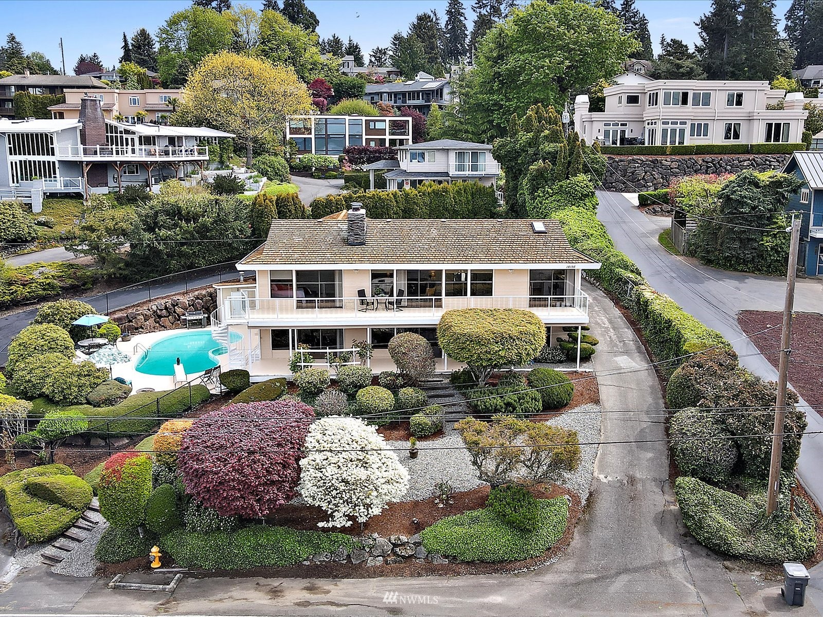 18156 Riviera Place Southwest Normandy Park, WA 98166 - Photo 1 of 40 a picture of houses with outdoor space