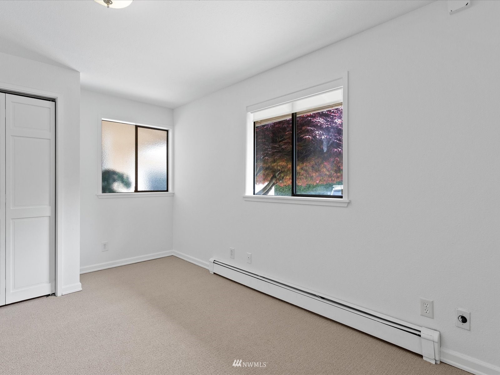 18156 Riviera Place Southwest Normandy Park, WA 98166 - Photo 13 of 40 an empty room with windows
