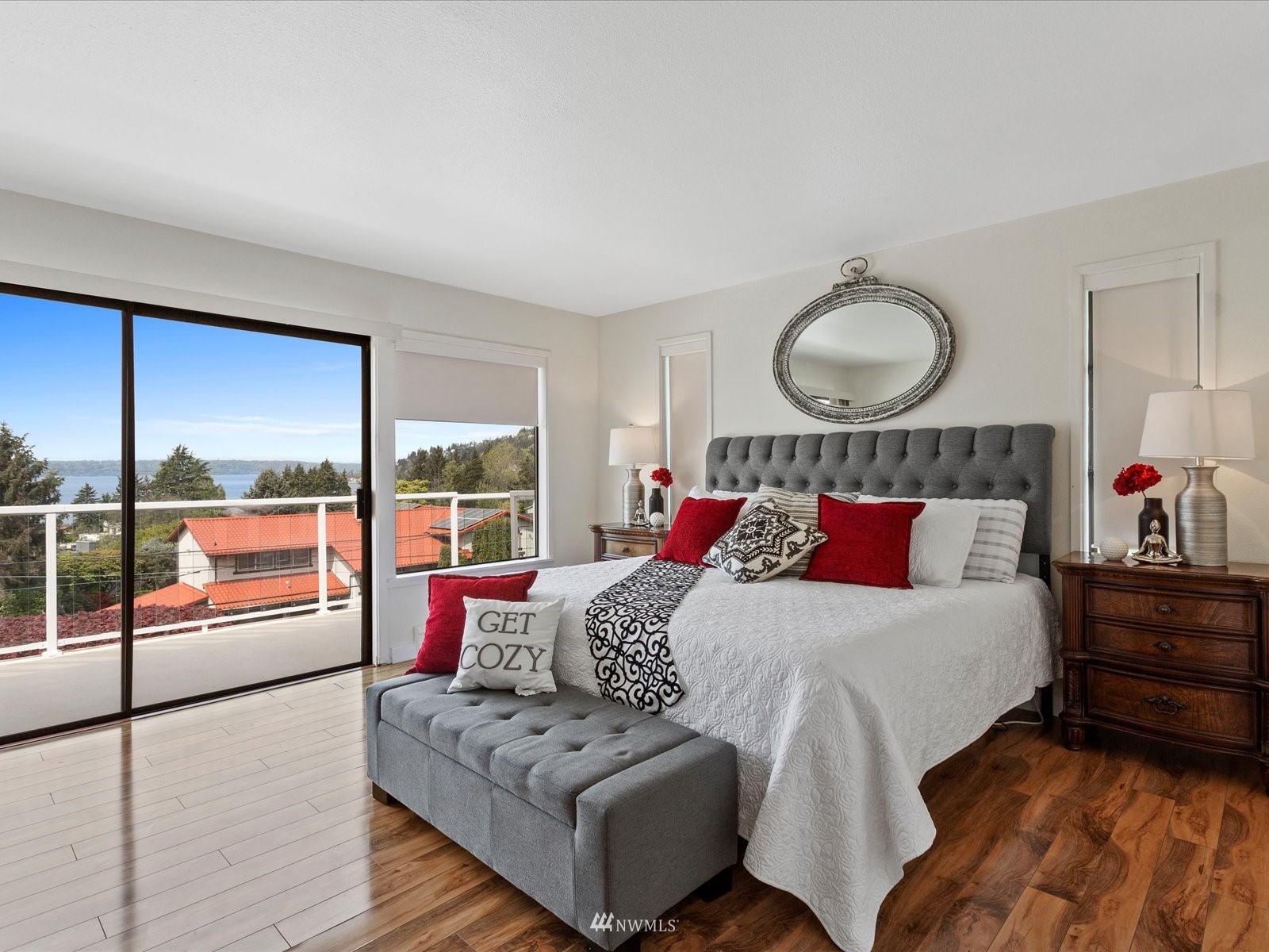 18156 Riviera Place Southwest Normandy Park, WA 98166 - Photo 16 of 40 a bedroom with a bed and wooden floor