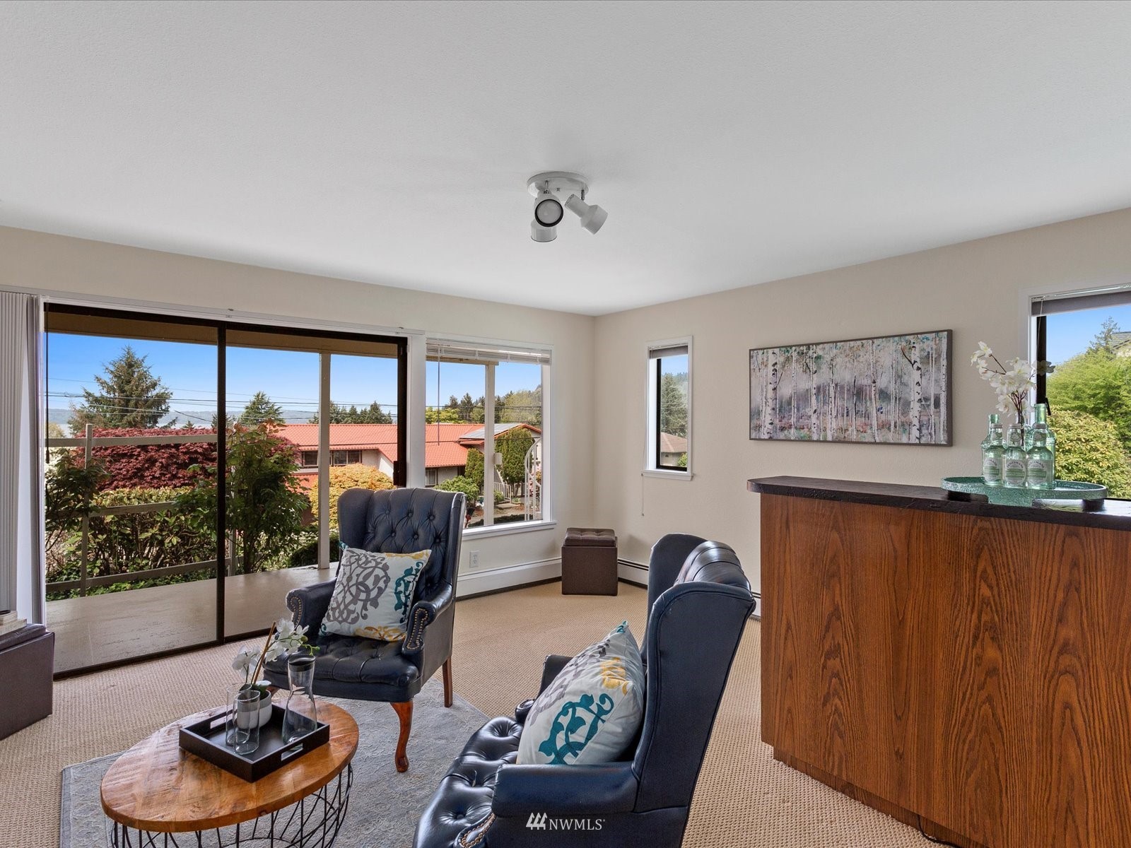 18156 Riviera Place Southwest Normandy Park, WA 98166 - Photo 27 of 40 a living room with furniture and a large window