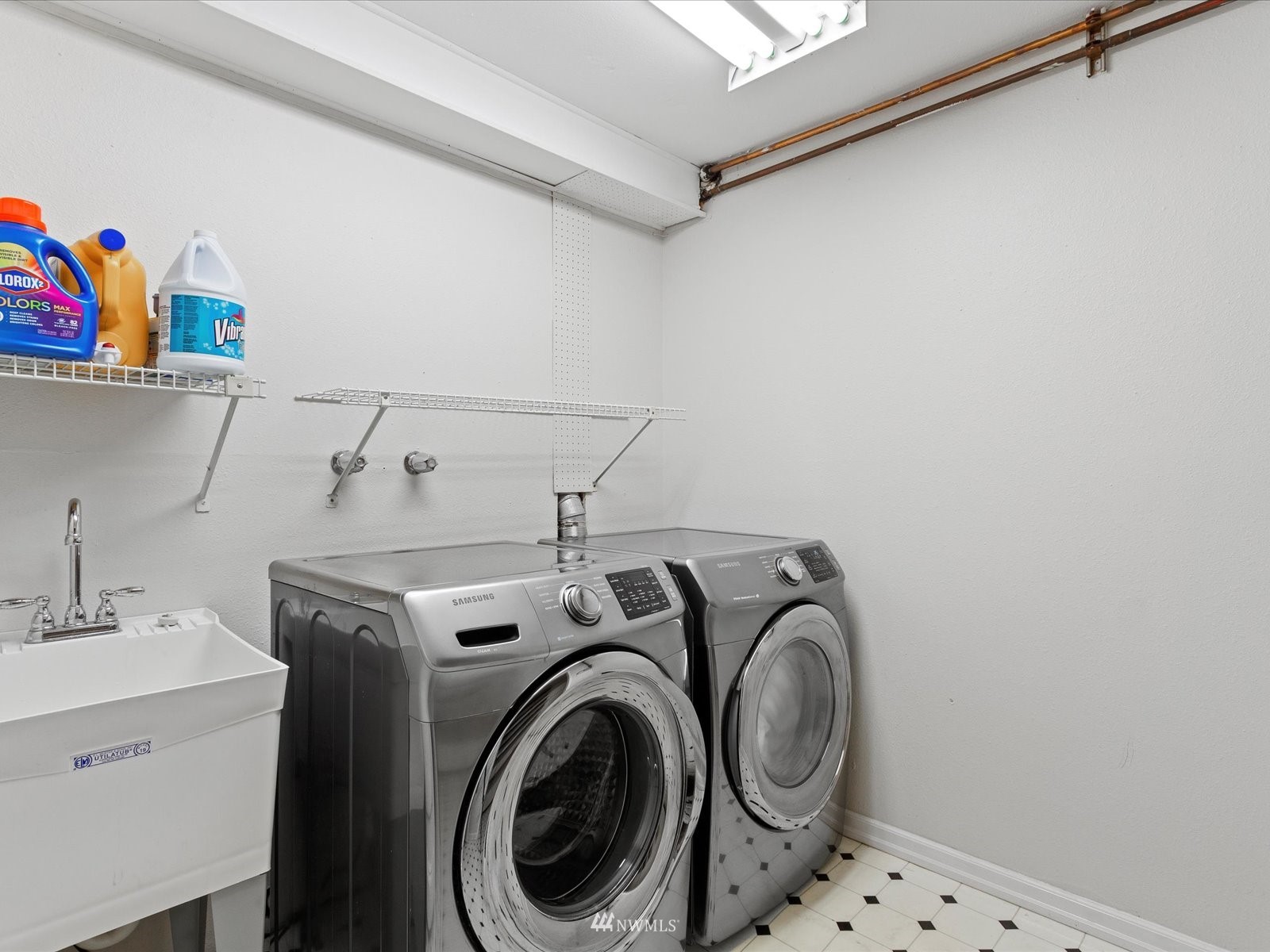18156 Riviera Place Southwest Normandy Park, WA 98166 - Photo 28 of 40 a utility room with dryer and washer