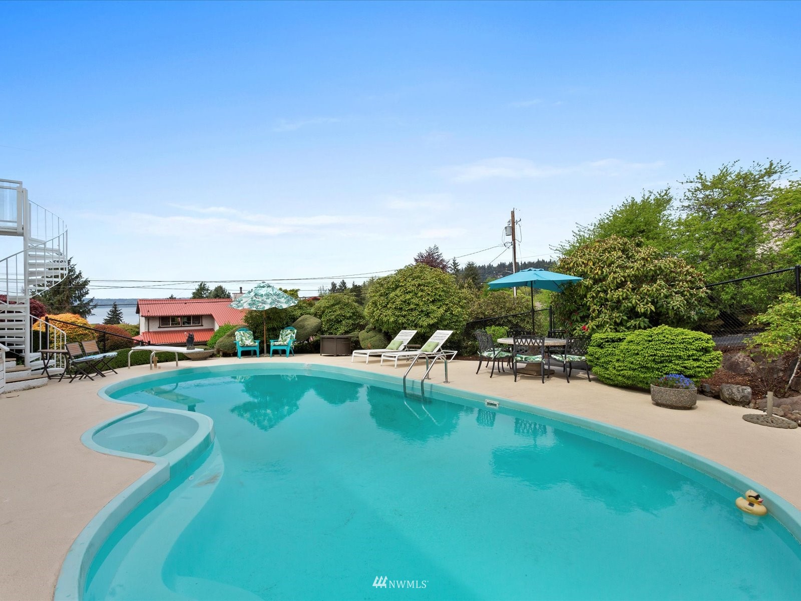 18156 Riviera Place Southwest Normandy Park, WA 98166 - Photo 30 of 40 a view of a street with houses
