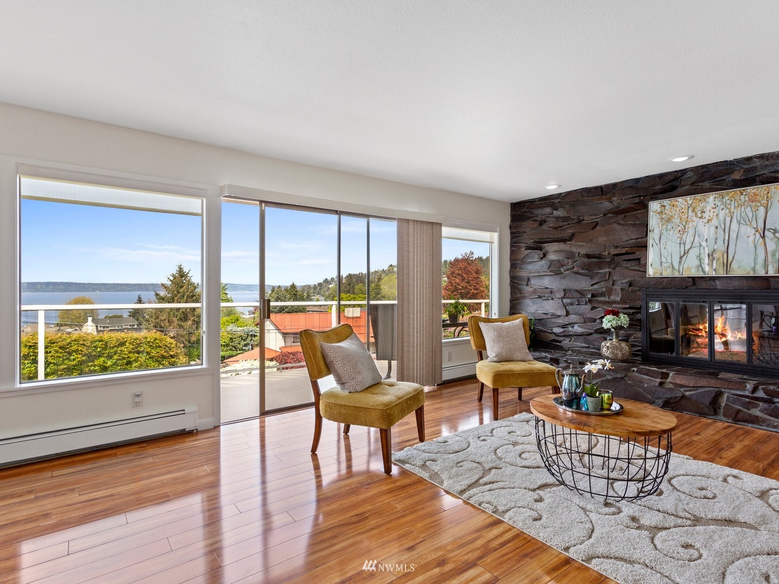 18156 Riviera Place Southwest Normandy Park, WA 98166 - Photo 5 of 40 a living room with furniture and a floor to ceiling window
