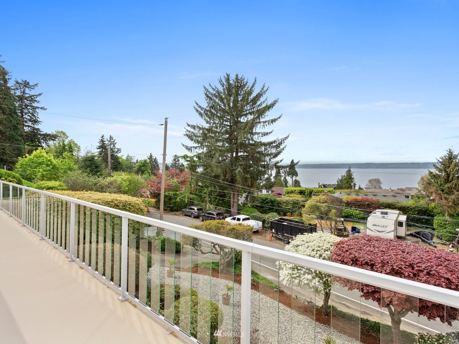 18156 Riviera Place Southwest Normandy Park, WA 98166 - Photo 8 of 40 a view of a balcony with wooden fence