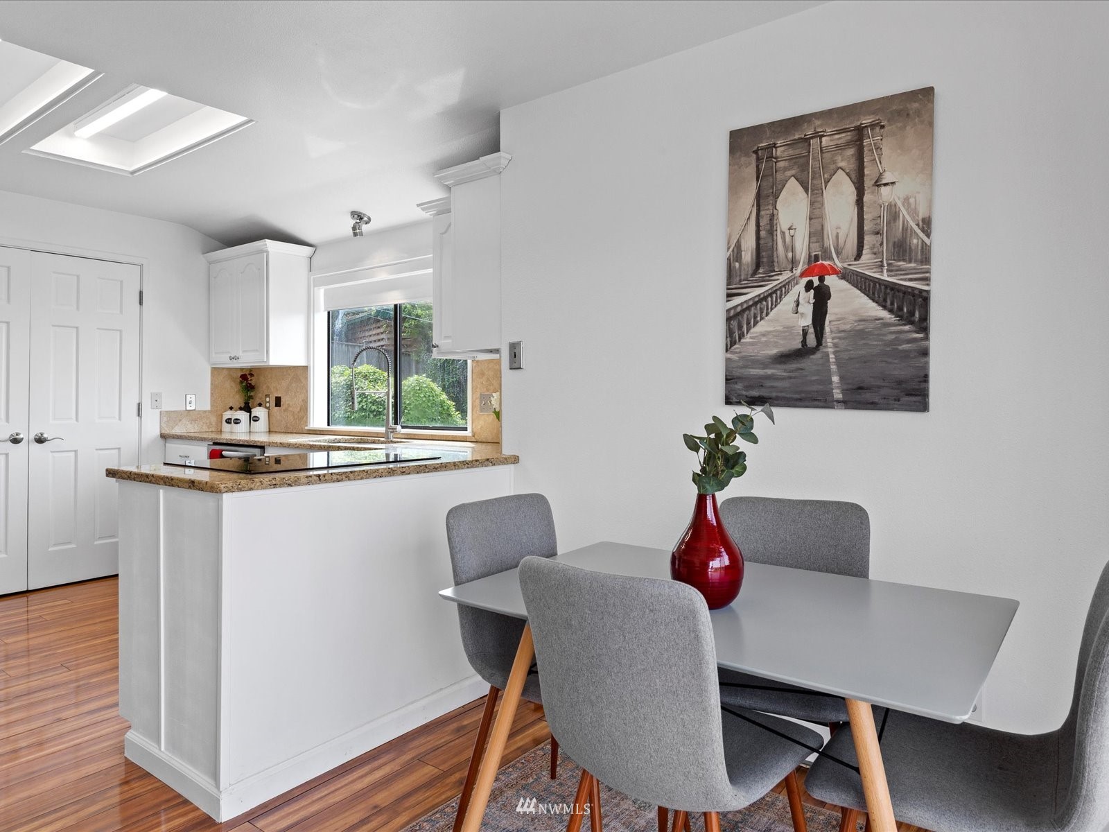 18156 Riviera Place Southwest Normandy Park, WA 98166 - Photo 10 of 40 a dining room with furniture and wooden floor