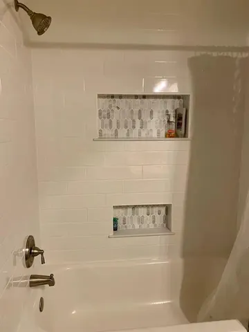 a bathroom with a bathtub