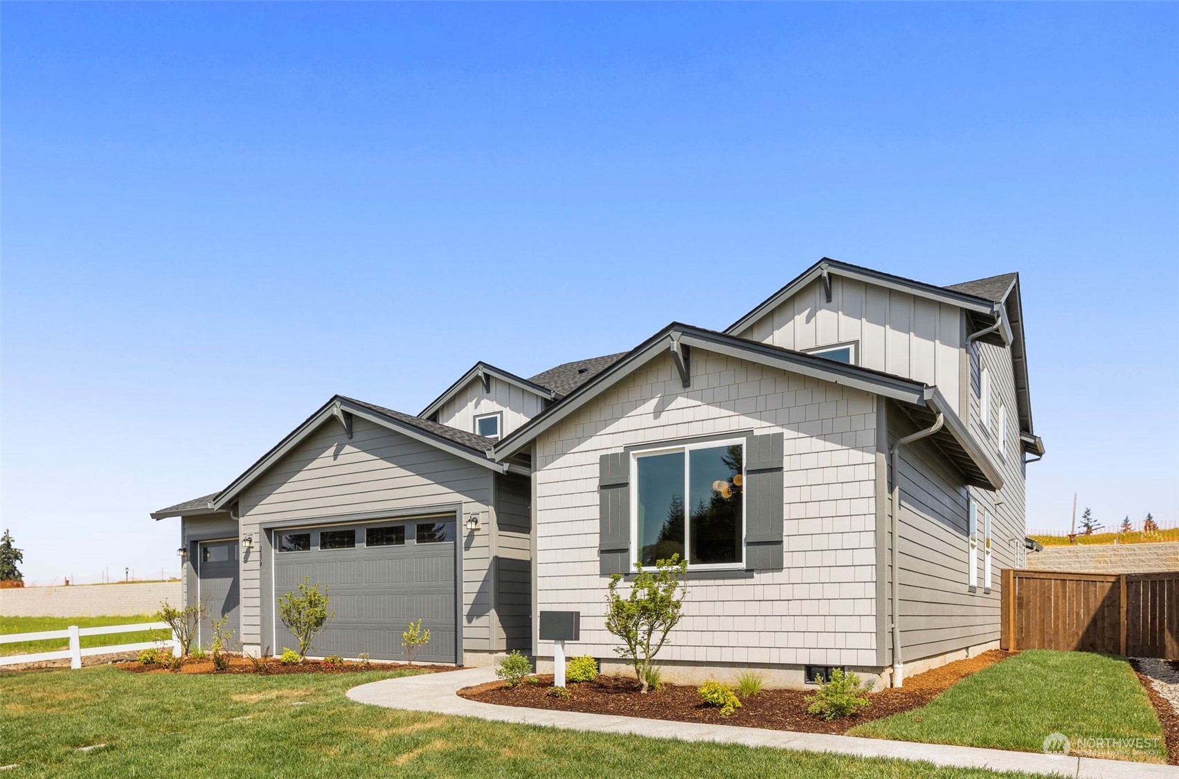 2814 South 9th Avenue Ridgefield, WA 98642 - Photo 1 of 37 a front view of a house with a yard