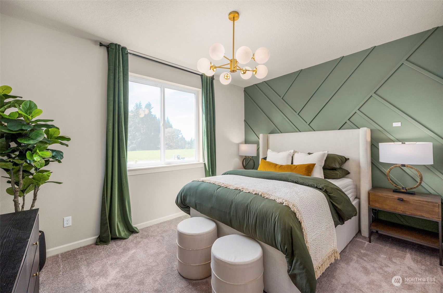 2814 South 9th Avenue Ridgefield, WA 98642 - Photo 12 of 37 a bedroom with a bed and a potted plant