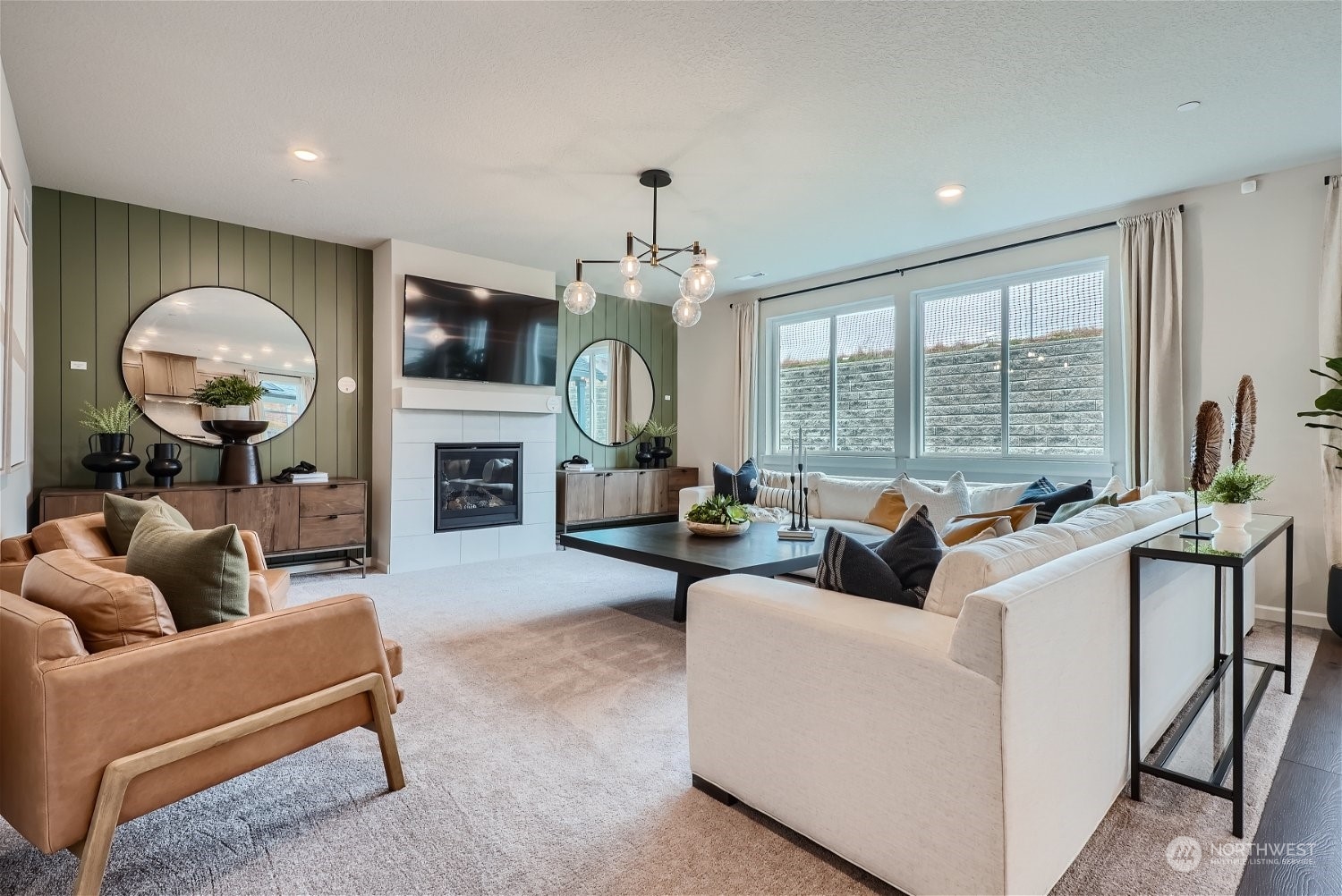 2814 South 9th Avenue Ridgefield, WA 98642 - Photo 26 of 37 a living room with furniture a large window and a fireplace