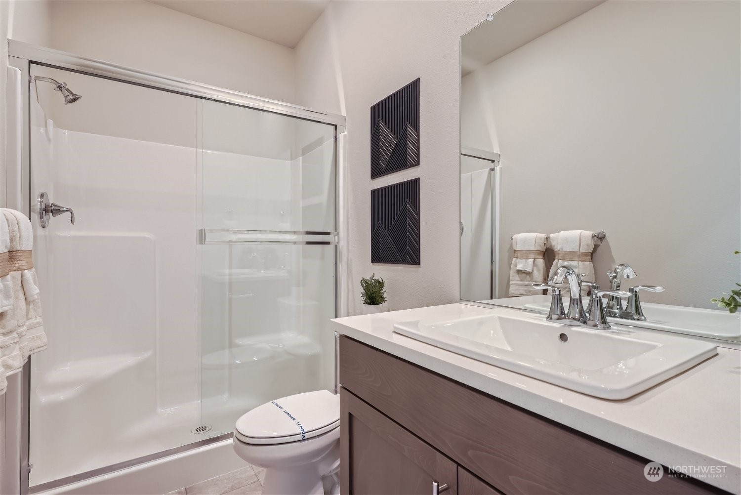2814 South 9th Avenue Ridgefield, WA 98642 - Photo 30 of 37 a bathroom with a sink and a mirror