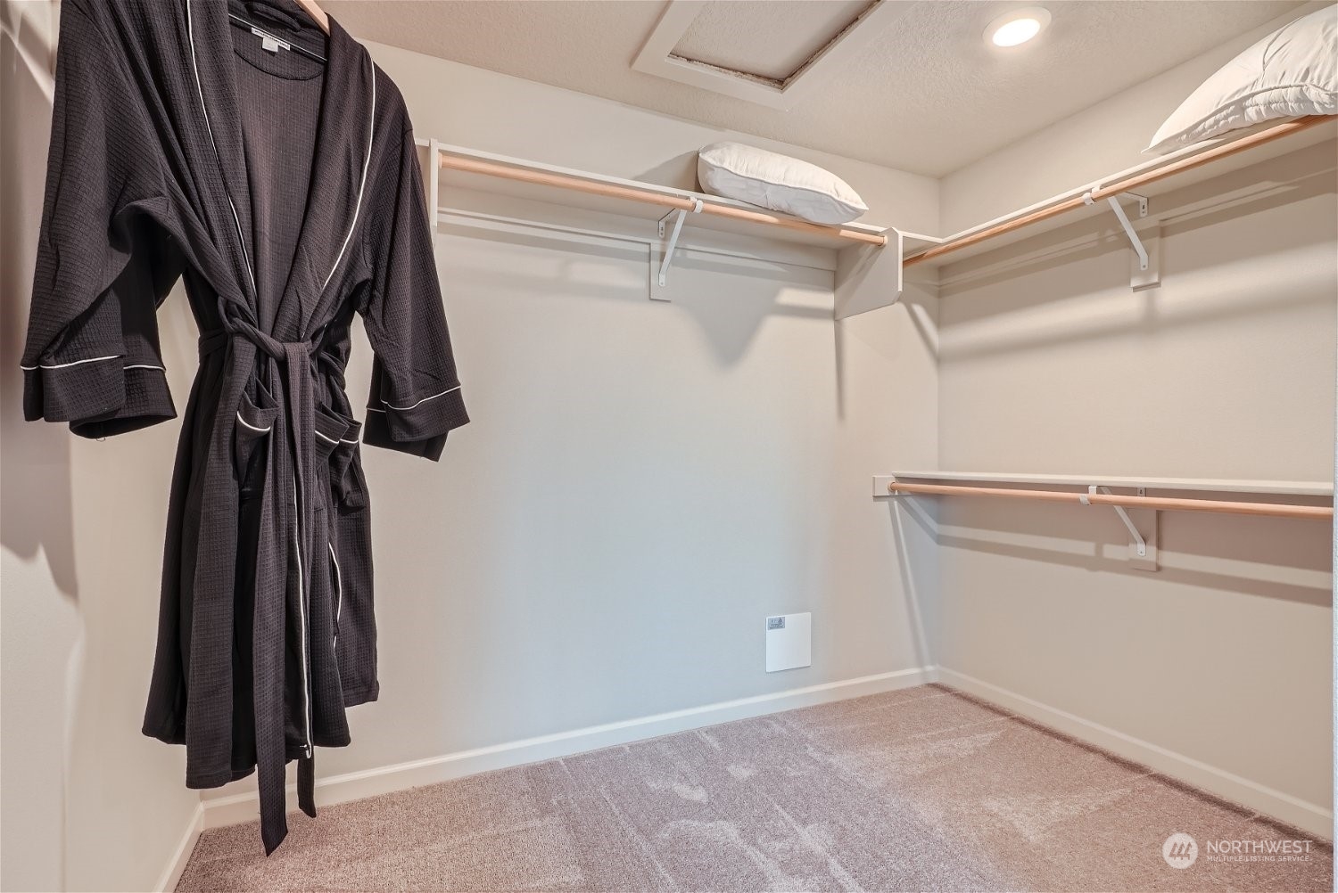 2814 South 9th Avenue Ridgefield, WA 98642 - Photo 32 of 37 a view of walk in closet with clothes and shoes