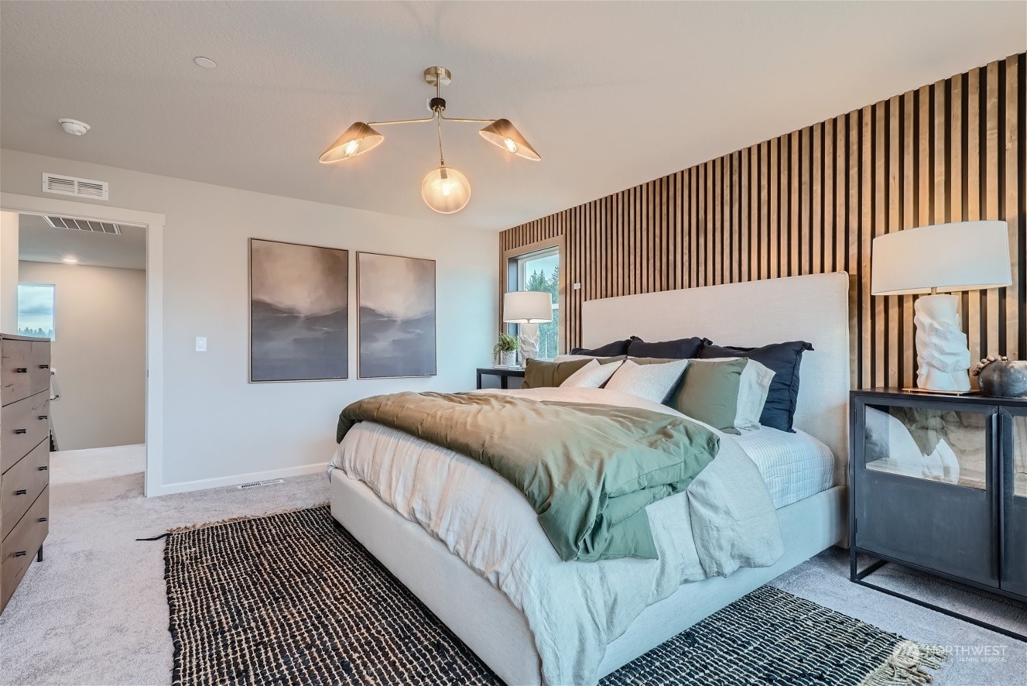 2814 South 9th Avenue Ridgefield, WA 98642 - Photo 33 of 37 a bedroom with a large bed rug and a window