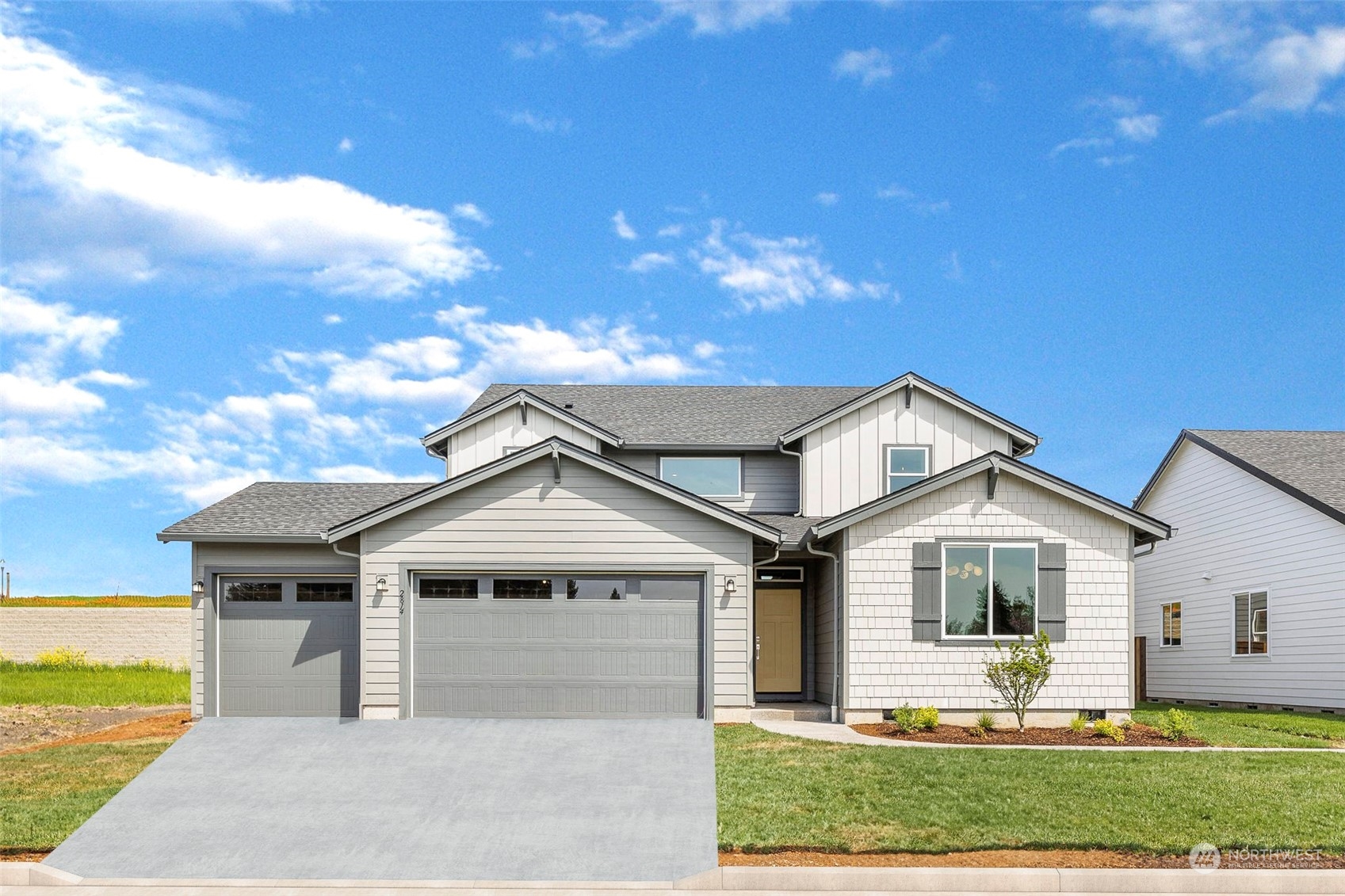 2814 South 9th Avenue Ridgefield, WA 98642 - Photo 35 of 37 a front view of a house with garden