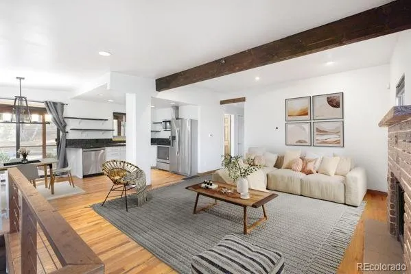 a living room with furniture and a table